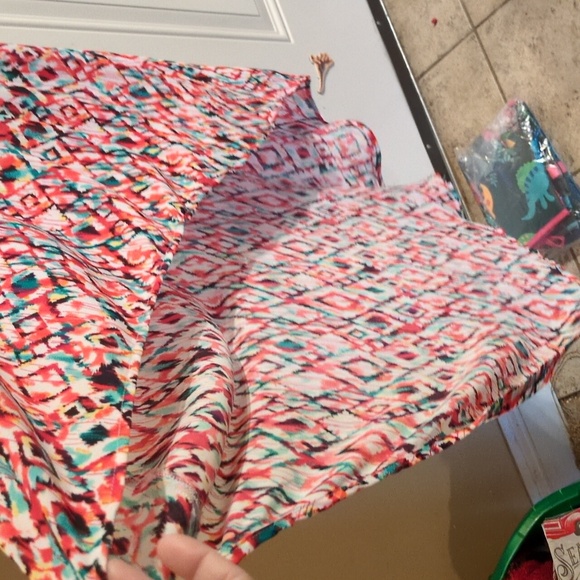 Upgrade Your Wardrobe with Rock 47 by Wrangler's Eye-Catching Asymmetrical Hem - Picture 3 of 12